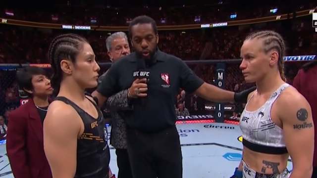 Alexa Grasso and Valentina Shevchenko stare down during their Noche UFC main event title fight.